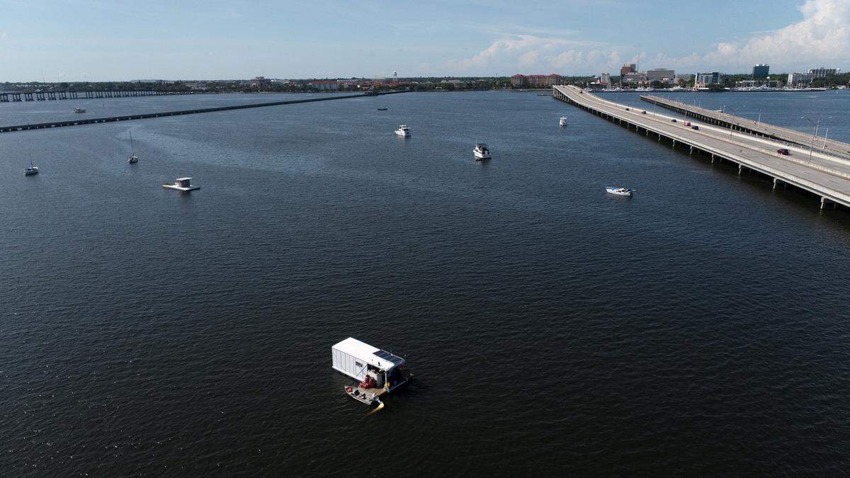 Several moored boats are regularly sitting in the waters to the east of Green Bridge when entering Palmetto. Some appear derelict; one was recently removed.