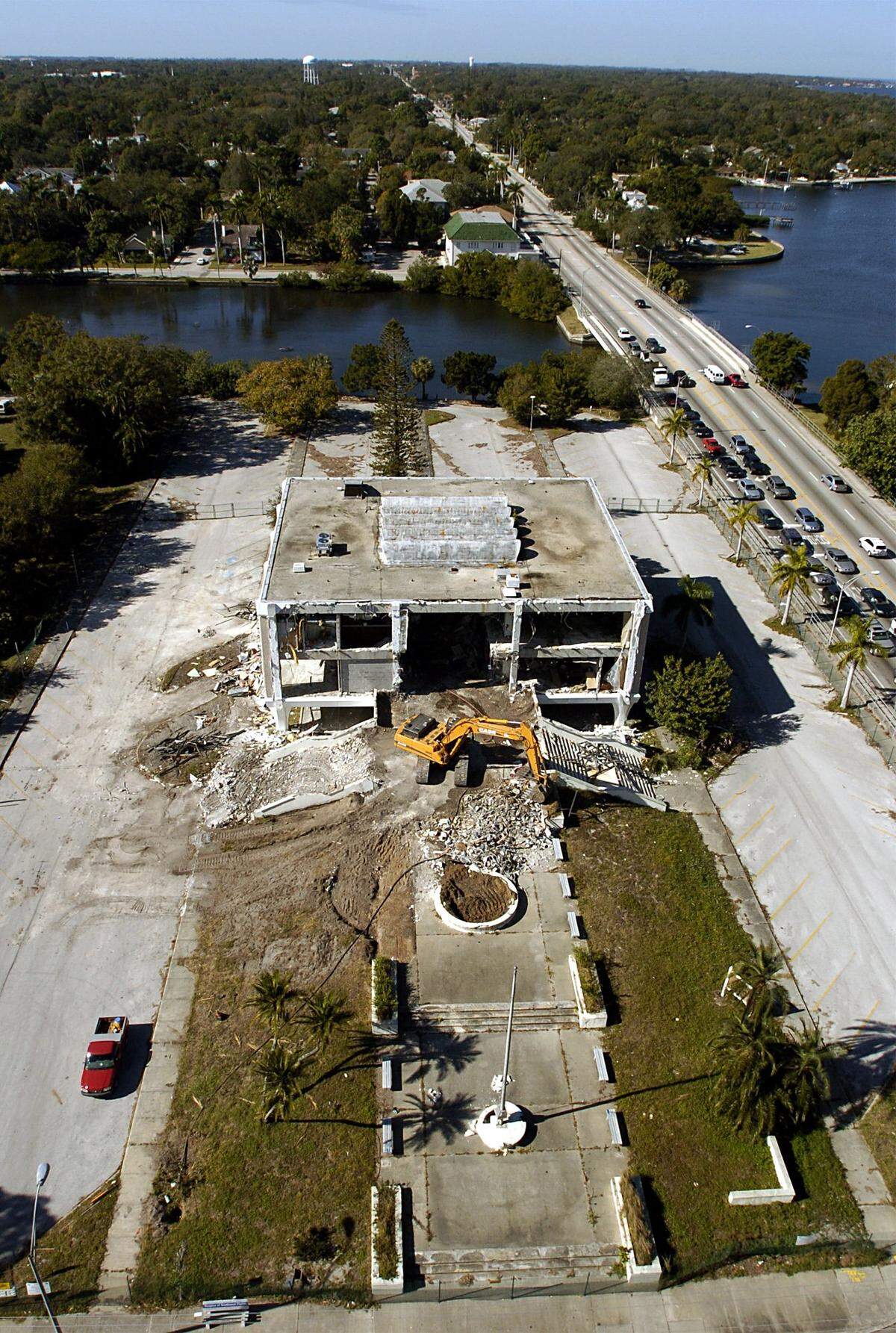 Terra Excavation, Inc. crews take a break from ripping out the exterior walls of the former Bradenton City Hall in 2004.