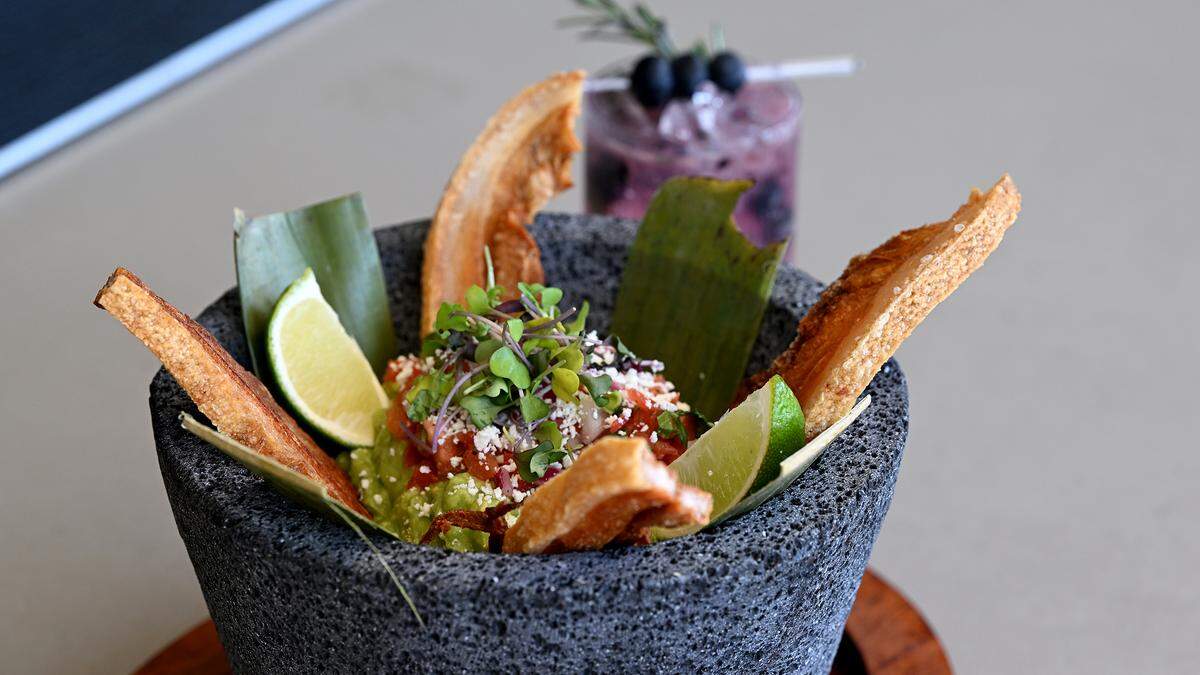 Chicharron, a dish of crispy fried pork belly with guacamole and pickled red onion, is served at Casa Blanca, 4230 14th St. W., Bradenton.