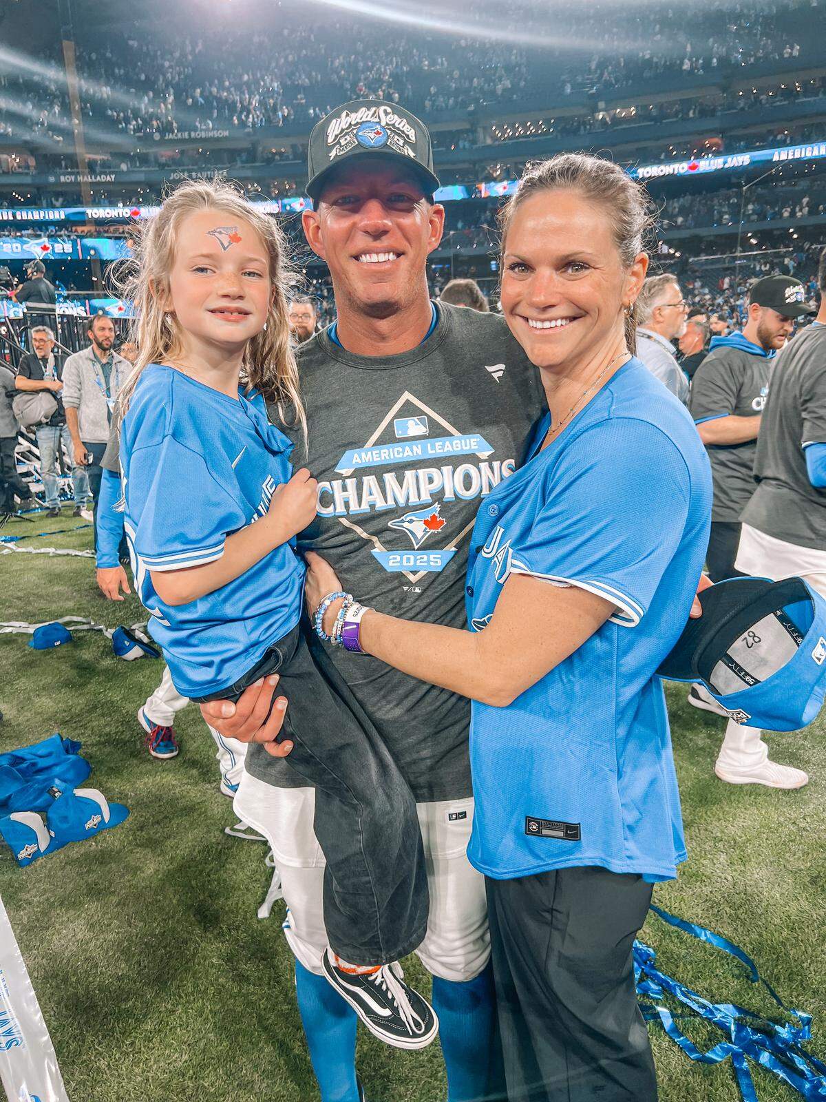 Toronto Blue Jays bullpen coach Graham Johnson joined by wife, Victoria Cable Johnson and daughter, Charlee after Monday night’s game in Toronto at Rogers Centre.