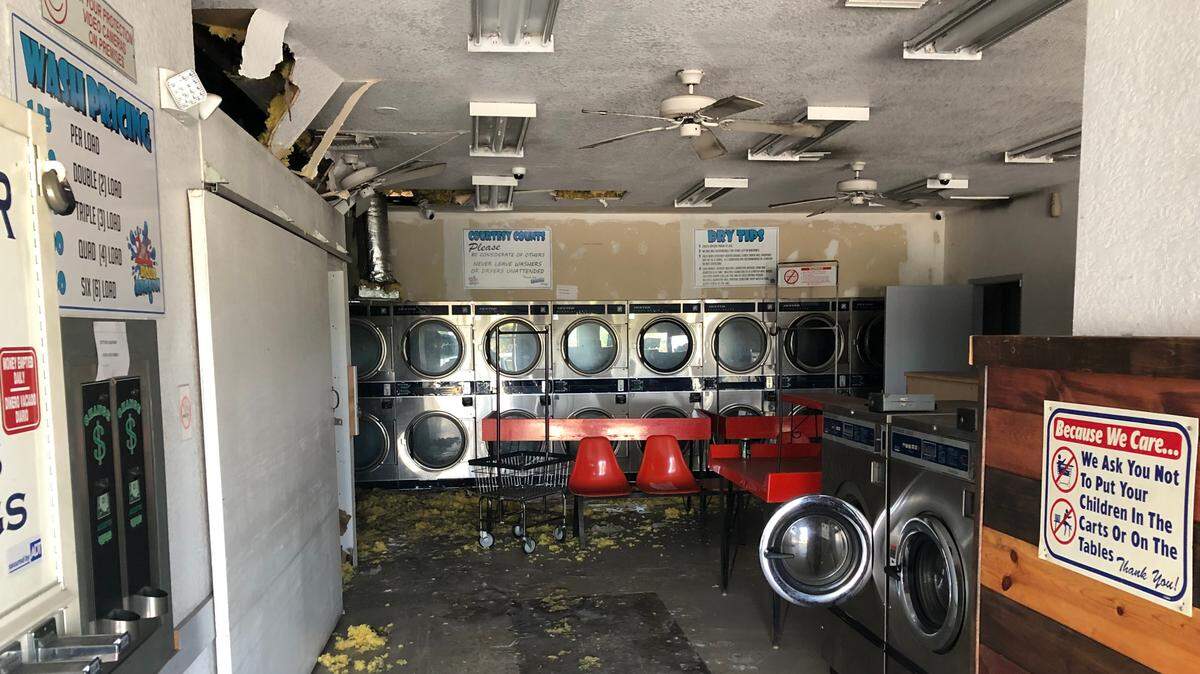 4/7/2021--Chuck Sanders’ King Koin laundromat was temporarily put of business on Saturday by a restaurant fire next door.