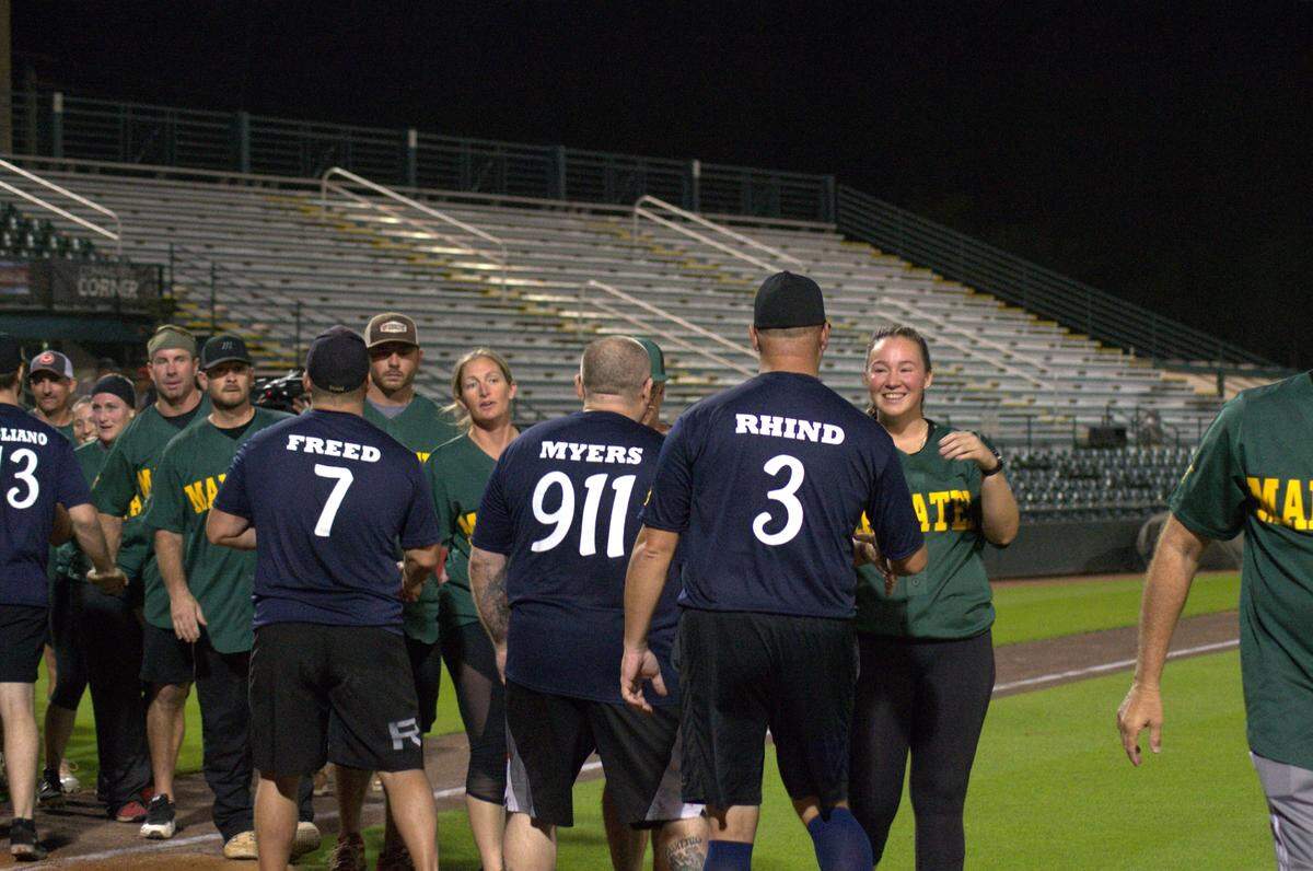 The Bradenton Police Department faced off against the Manatee County Sheriff’s Office in “Battle of the Badges,” a baseball match for charity at LECOM Park on Tuesday.