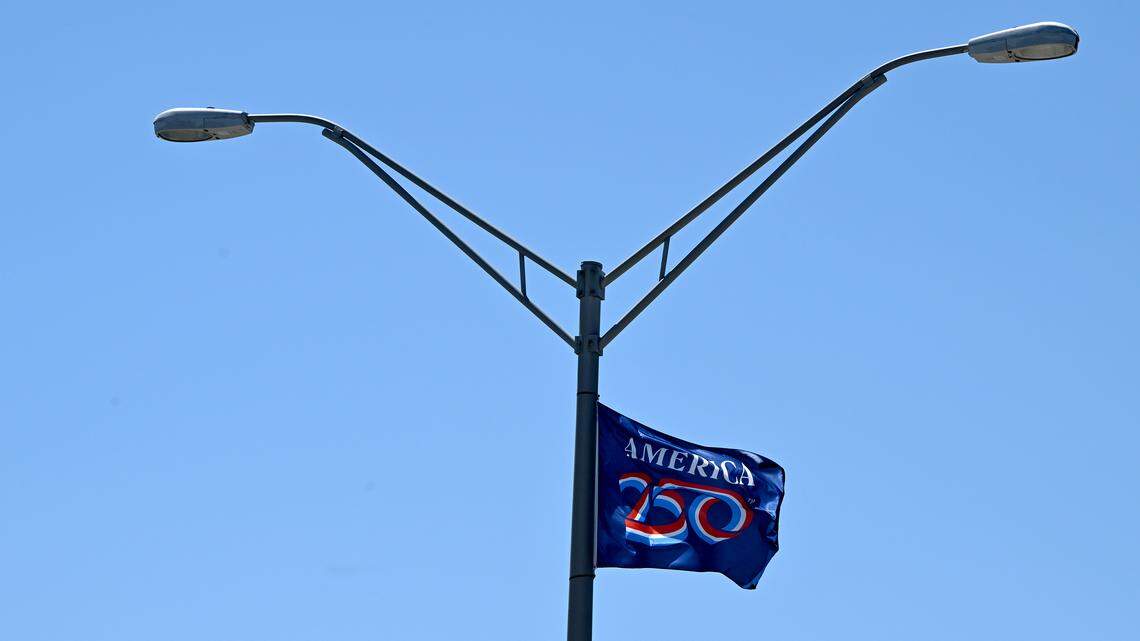 American flags fly from the light posts along the Green Bridge spanning from Bradenton to Palmetto shown on April 24, 2026. On the center pole flies a flag commemorating America’s 250th anniversary.