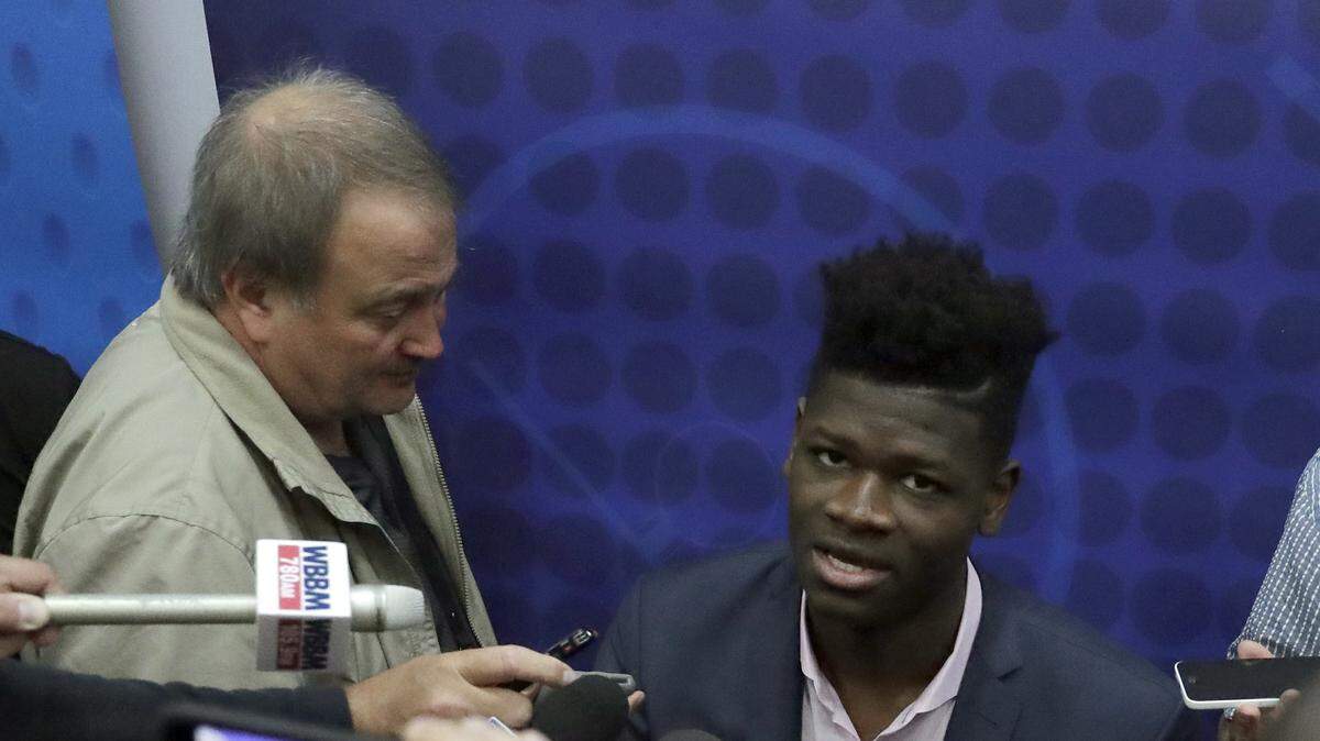 In this file photo, Mohamed Bamba, from Texas, speaks with the media at the NBA draft basketball combine Thursday, May 17, 2018, in Chicago.