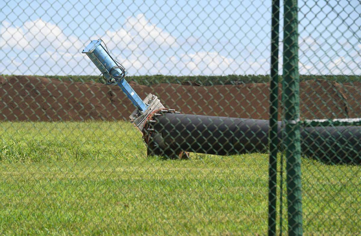 08/12/21—A clamping device closes off a large pipe used to release toxic waters from Piney Point which then flow into Tampa Bay at Port Manatee. Due to heavy rainfall, state officials are asking a judge to consider an emergency hearing that would hand over control of the Piney Point site to a third-party operator before there’s another leak or spill at the former phosphate processing plant.