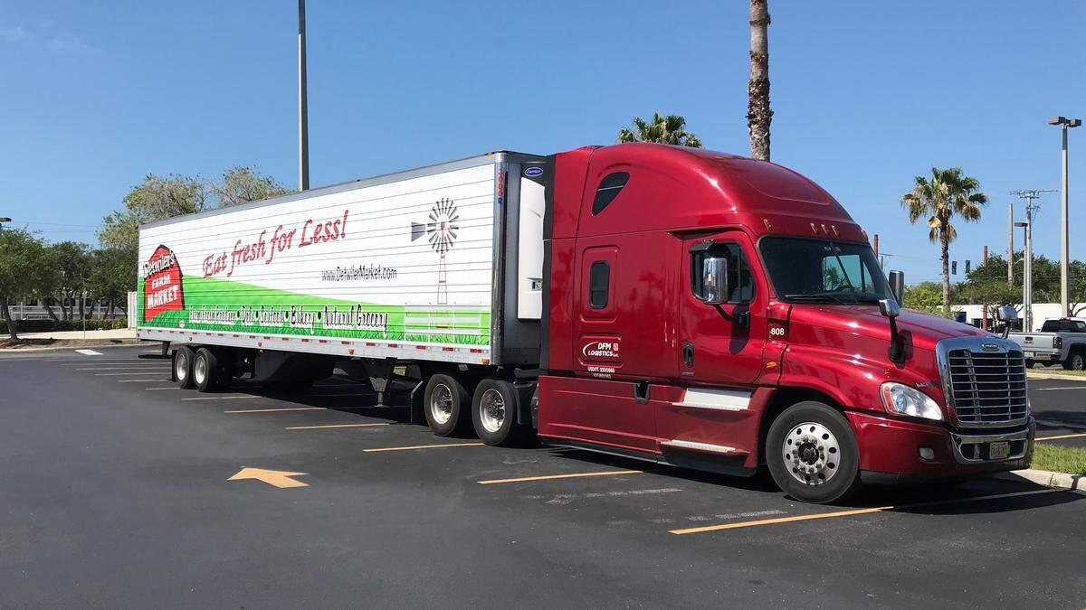 A Detwiler’s Farm Market tractor-trailer was parked outside 2881 Clark Road, Sarasota, during the announcement of plans for the company’s fifth store.