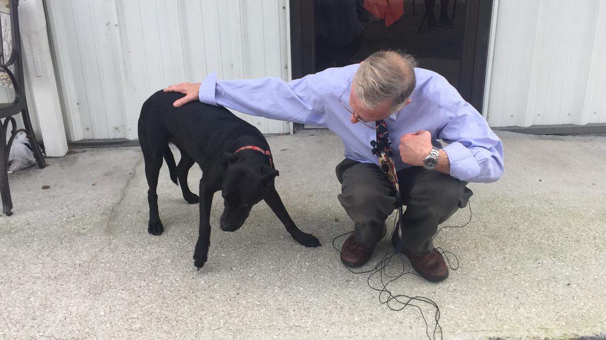 Paul Gartenberg, owner of Pet Clinic and Padi, next to Padi after Judge Andrew Owens ruled a Florida law was unconstitutional so Padi would not be euthansized. 
 CLAIRE ARONSON/Bradenton Herald
