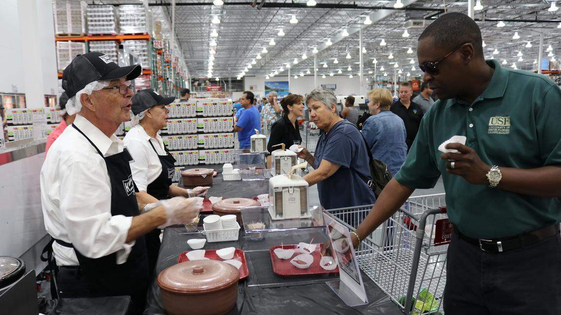 Food sampling is a Costco Wholesale tradition. A shopper samples the Kielbasa smoked sausage at the opening of the new Bradenton warehouse.