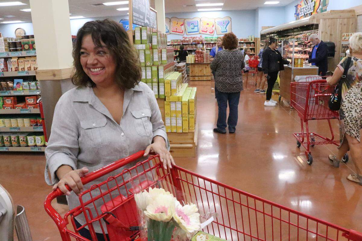 An estimated 300 shoppers, among them Vivian Vergara, were lined up for the opening of Manatee County’s first Trader Joe’s on Thursday, 10/26/2023. The new store is at 8111 Cooper Creek Blvd.