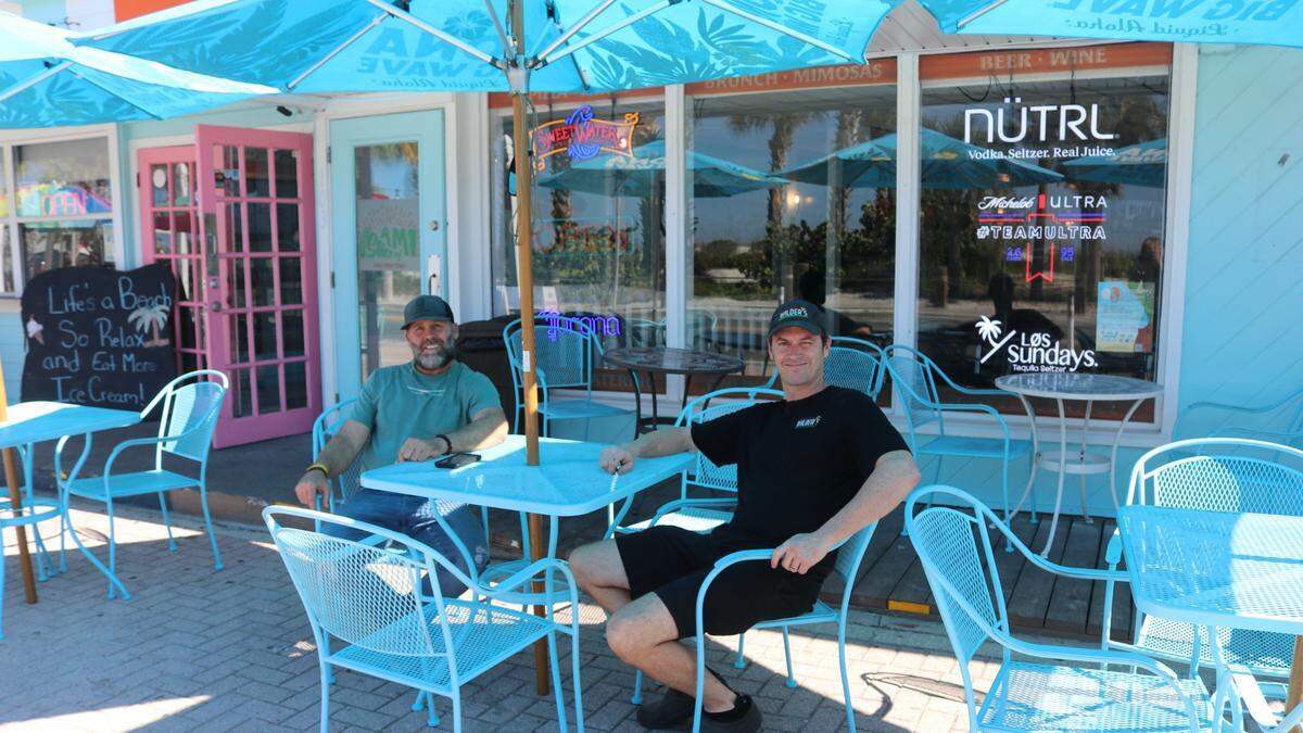 Guests at Wilder’s Slice of AMI, 103 Gulf Drive N., Bradenton Beach, may sit inside the dining room or take advantage of sidewalk seating facing onto beach dunes and the Gulf of Mexico. Shown above are partners Walter Loos, left, and Ryan Wilder.