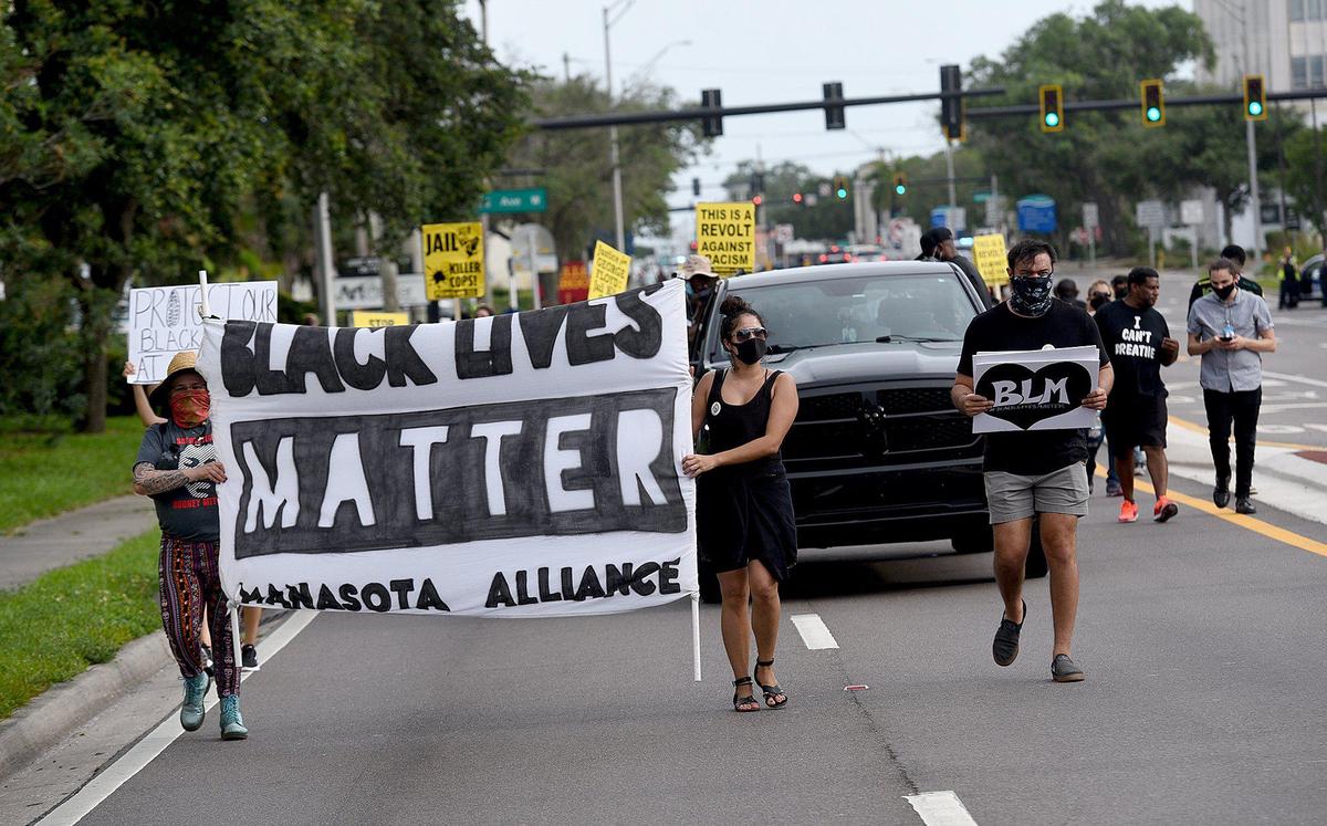 Black Lives Matter Manasota Alliance marched against racism from Bradenton over the Green Bridge and joined an earlier group in Sutton Park in Palmetto.