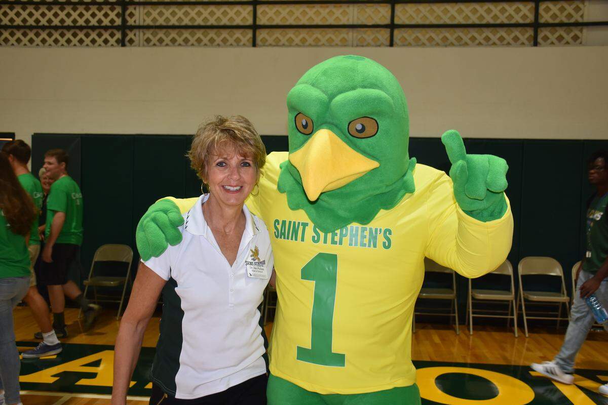 Saint Stephen's headmaster Dr. Jan Pullen (left) is recovering from breast cancer surgery. The Falcons swim team is swimming in her honor at the Swim Across America event in Tampa Bay on Saturday, April 14, 2018.