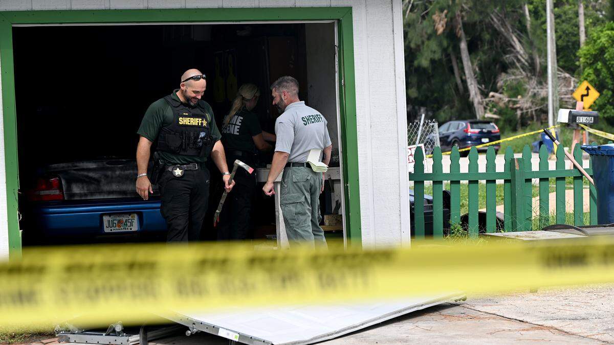 Manatee County Sheriff’s Office deputies continue to gather evidence and investigate at the scene of an hours-long standoff in the 800 block of 63rd Avenue West on September 11, 2025. While attempting to serve a warrant related to armed robbery, the suspect fired shots at deputies, the sheriff’s office said.