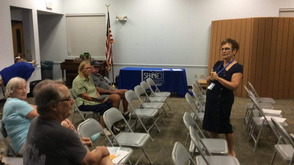 Sue LaMastro, right, speaks to a small group at the Manatee Public Library's South County branch Friday about Medicare enrollment for 2016. LaMastro is one of 11 Manatee volunteer counselors with SHINE, which stands for Serving Health Insurance Needs of Elders. cRICHARD DYMOND/Bradenton Herald