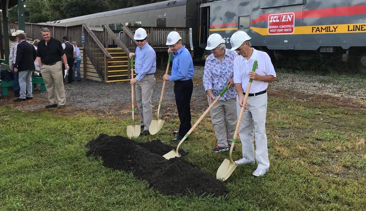 Dignitaries tossed a few shovels of earth Thursday at the groundbreaking for new facilities planned for the Florida Railroad Museum in Parrish.