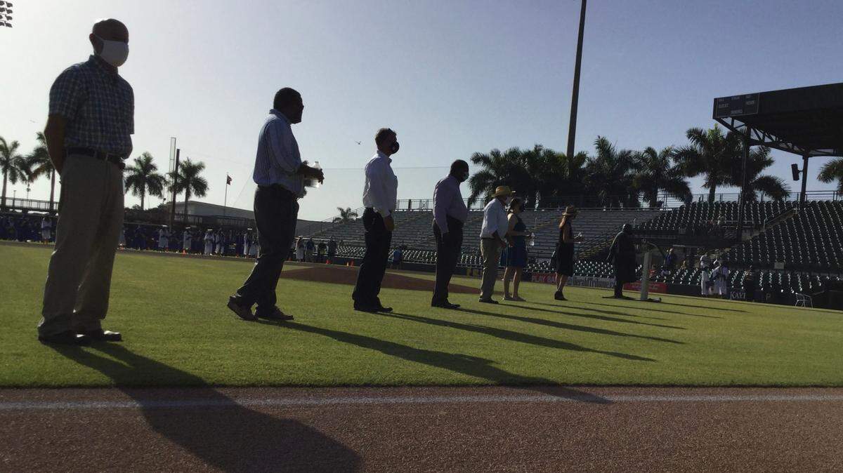 Bayshore High School Principal Wendell Butler and Manatee County School District staff and board members were on hand to celebrate the graduating seniors on Saturday at LECOM Field.