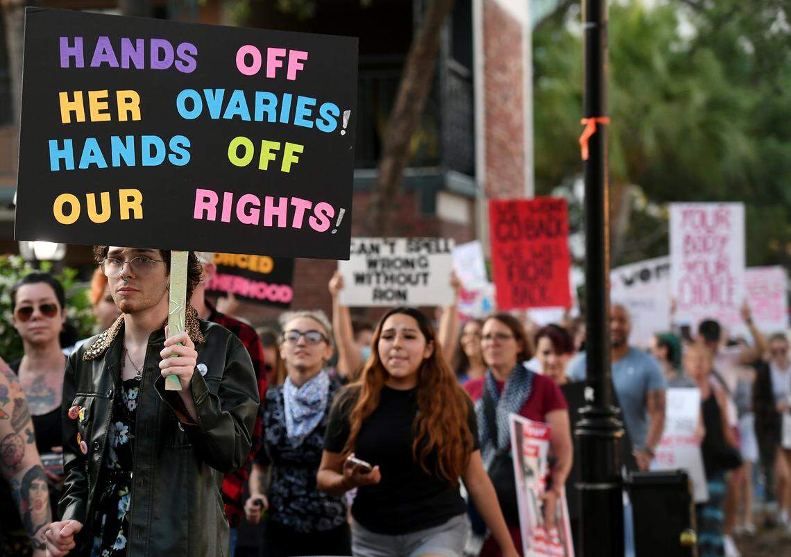 Over a hundred people joined a march and rally organized by Women’s Voices of SW Florida to support women’s rights to choose abortion on May 4, 2022. The group met at the Central Library and marched to the Historic Courthouse.