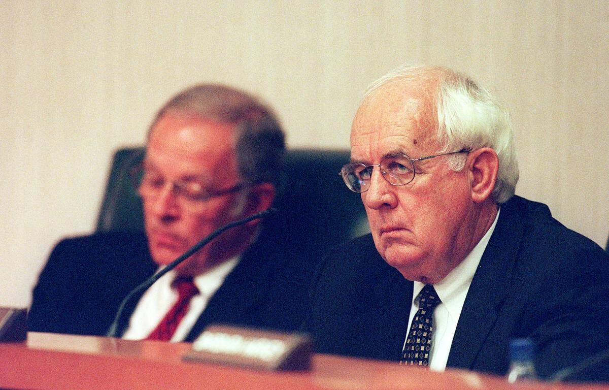 School Board member Walter Miller, right, may replace Gene Denisar, left, as Superintendant of Manatee County Schools. Photo Alex Diaz 01.10.2000