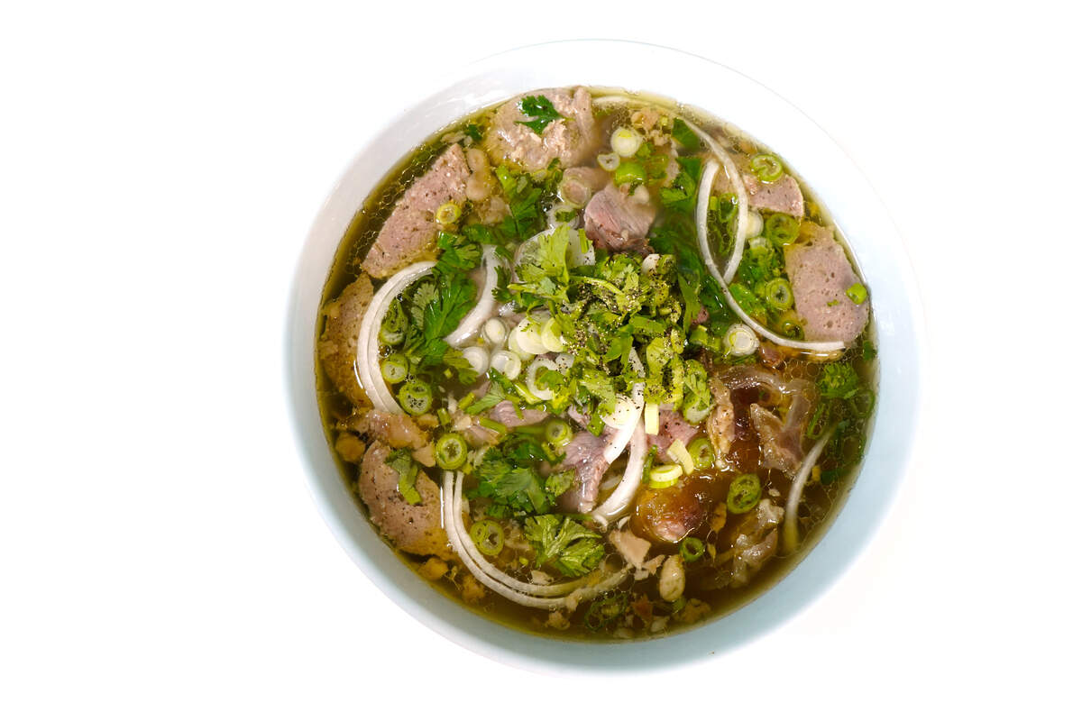 Some rank pho at the pinnacle of Vietnamese cuisine. At Bun-Haus Vietnamese Kitchen, a bowl of savory beef noodle soup sells for $13.