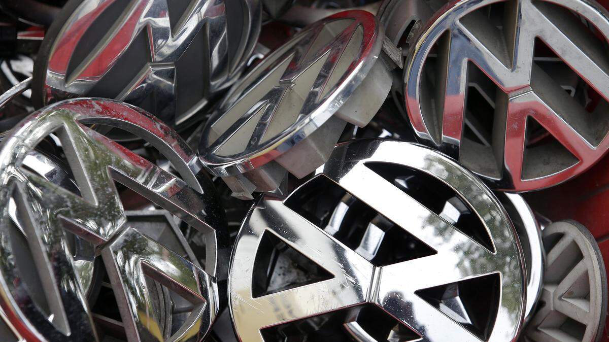 FILE - In this Sept. 23, 2015 file photo Volkswagen ornaments sit in a box in a scrap yard in Berlin, Germany. Federal authorities are suing Volkswagen over emissions-cheating software found in nearly 600,000 vehicles sold in the United States. The Justice Department and the Environmental Protection Agency on Monday filed a civil complaint against the German automaker in U.S. District Court in Detroit. (AP Photo/Michael Sohn, file)