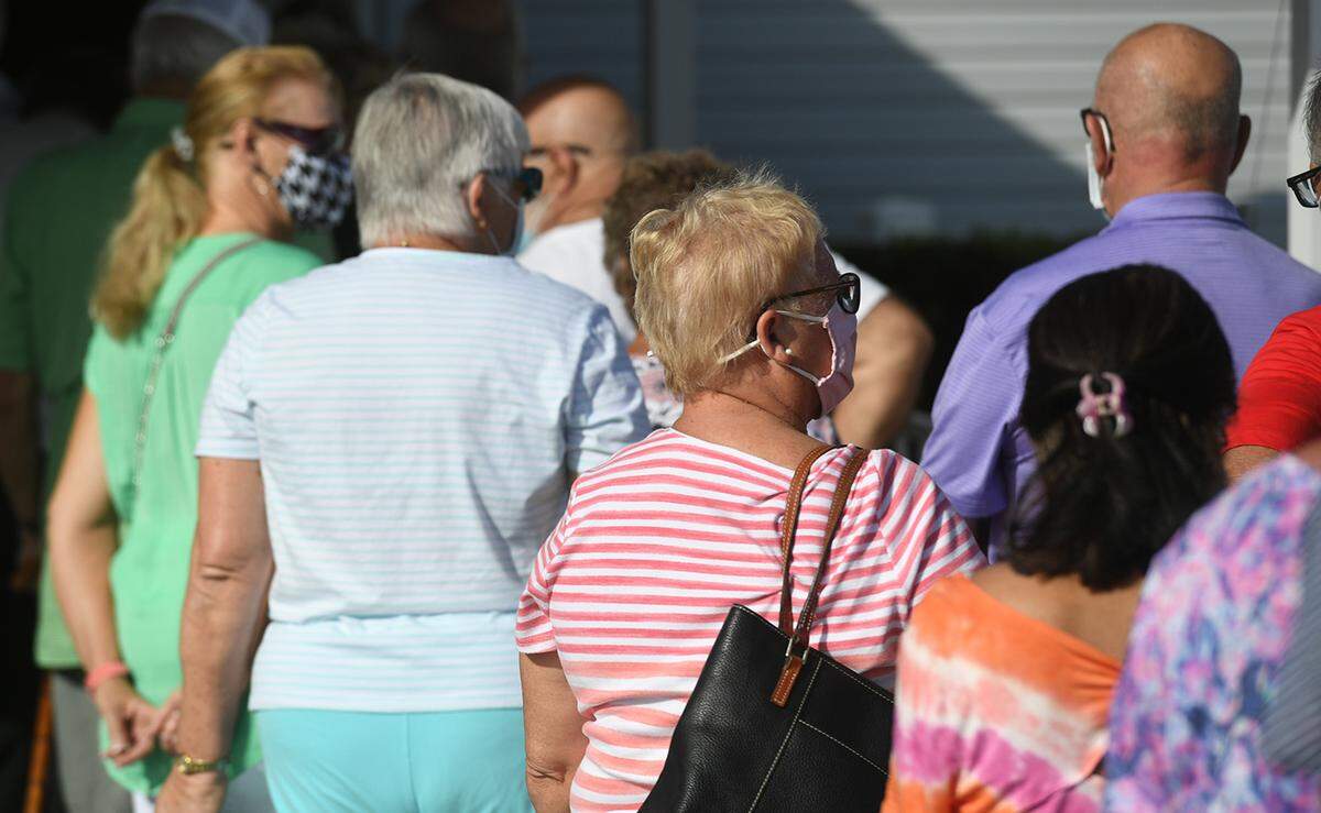 03/02/21--People 65 and over at Colony Cove in Ellenton to make appointments and get vaccinated against COVID-19.