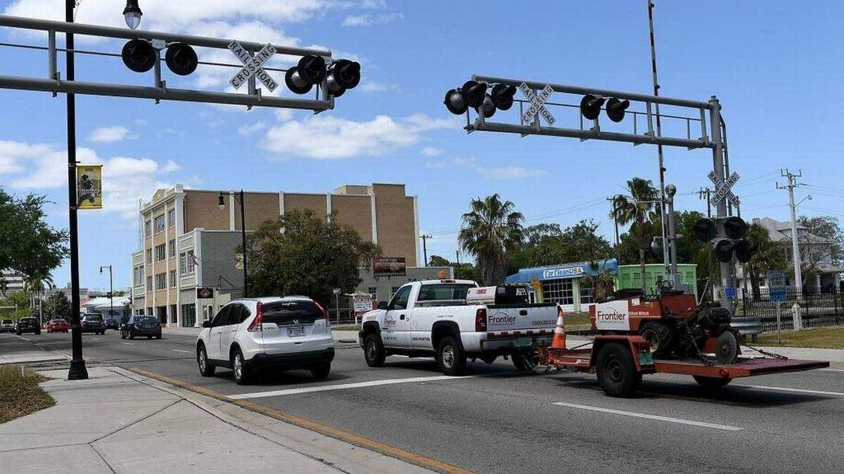 The CSX Railroad crossing, pictured here before the May replacement, had its new arms stuck in the down position Friday morning just in time for the morning commute to cause traffic woes through the downtown area.