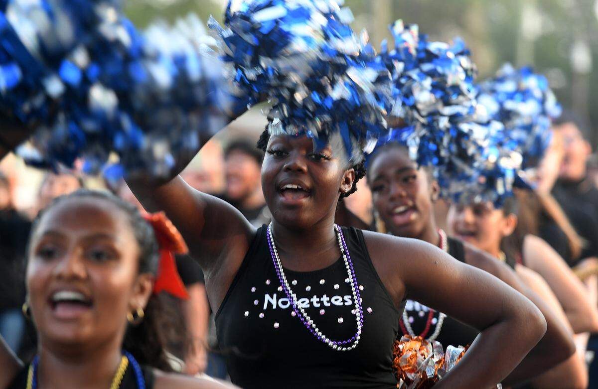 04/24/21--Southeast High’s marching band and dancers perform in a past De Soto Grand Parade.