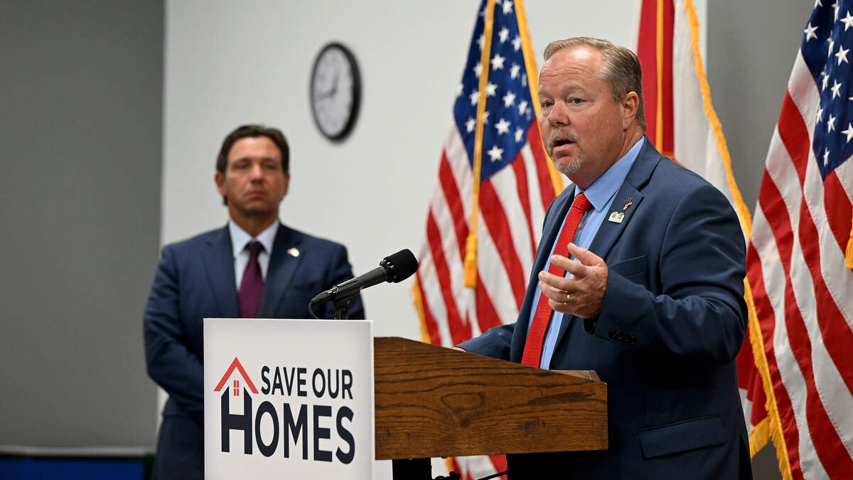 Bradenton Mayor Gene Brown joined Gov. Ron DeSantis as he signed two bills enacting stricter regulations on local governments’ ability to raise taxes and creating more transparency at State College of Florida on June 24, 2026.