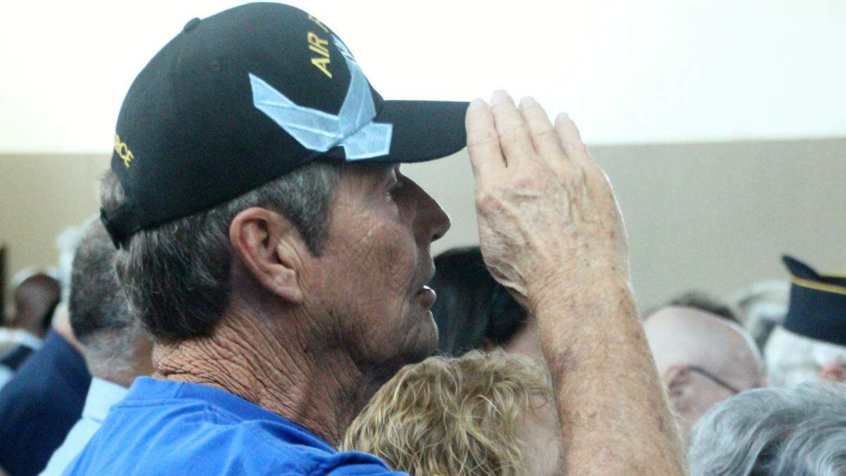 A veteran salutes during the Pledge of Allegiance at the Bradenton National Guard Armory. Manatee County has a veterans population estimated at more than 30,000. A variety of local Veterans Day activities are planned this year.