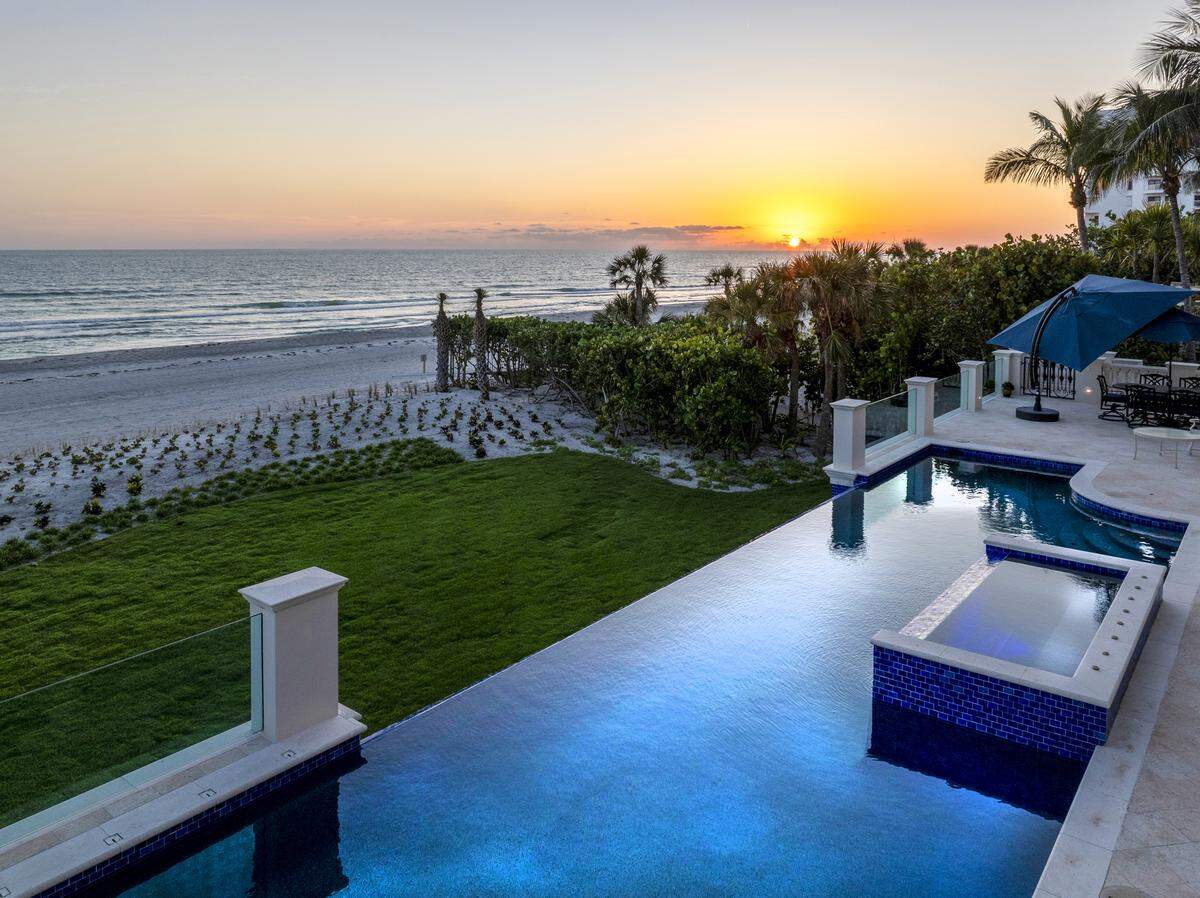 A Longboat Key mansion, seen here with private beach access and Gulf of Mexico views, recently sold for a record $30.3 million.