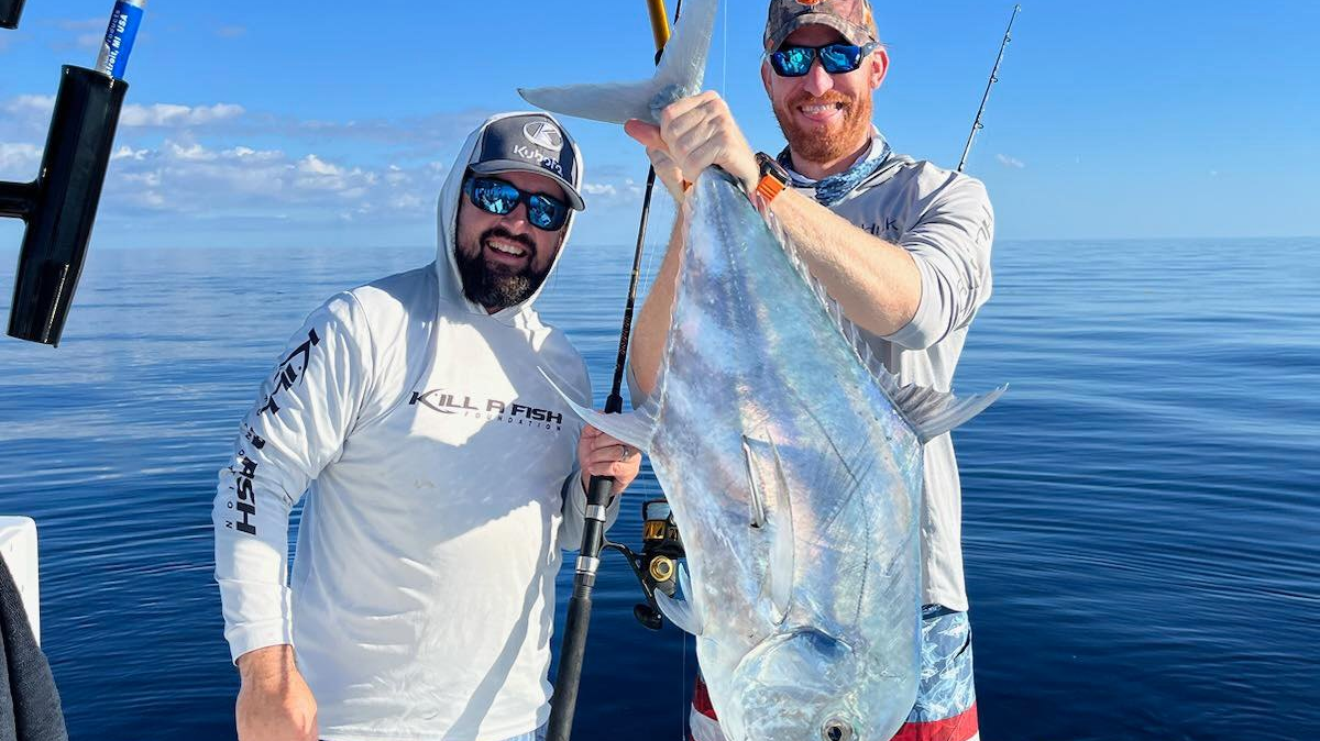 Aaron Albritton, left, and John Rendemonti with an African pompano caught Jan. 9, 2023, in the Gulf of Mexico.