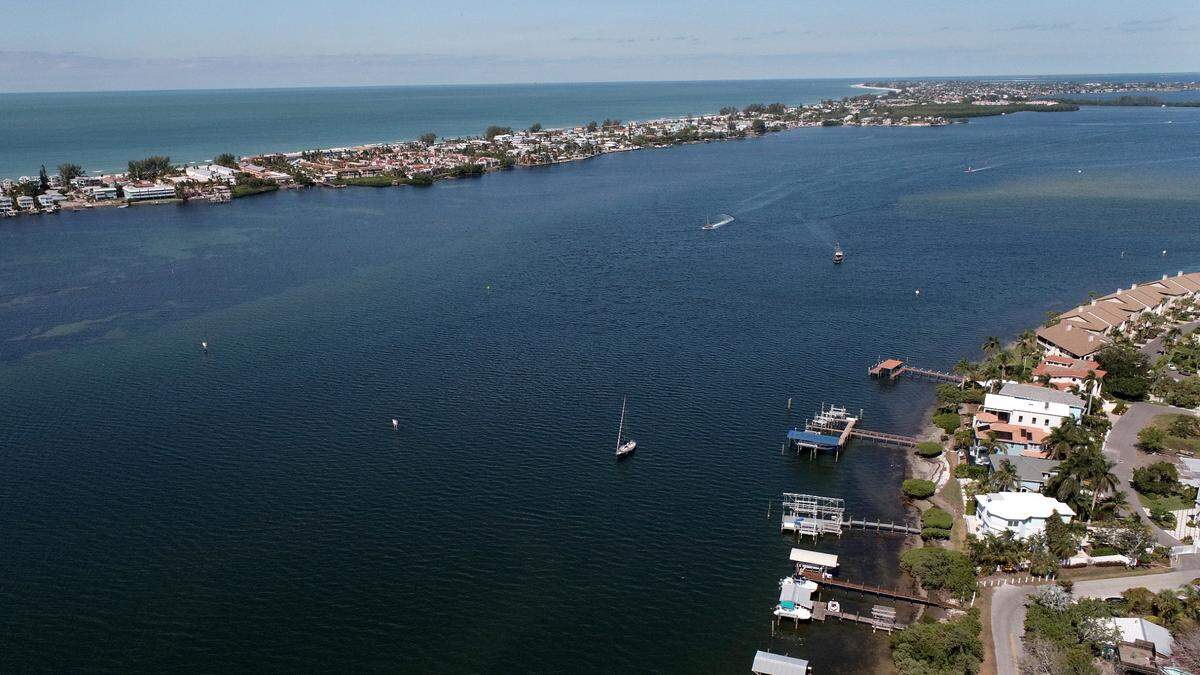 The Florida Department of Environmental Protection has proposed adding Anna Maria Sound to the state’s list of impaired waters due to an overabundance of nutrients in the water. Looking north towards the Anna Maria Island Bridge from the Cortez Bridge, Tuesday, Oct. 17, 2023.