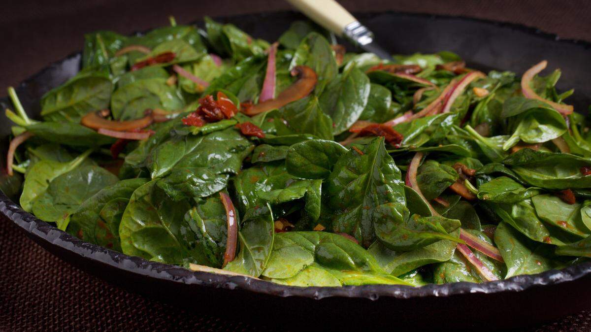 Warm Spinach Salad With Mushrooms and Sun-Dried Tomatoes. THE WASHINGTON POST