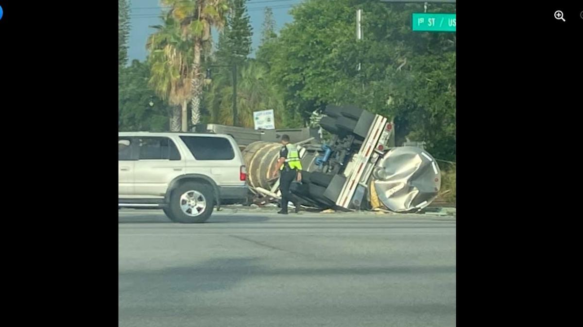 6/6/21--Emergency crews respond to an overturned semi-truck at the corner of Ninth Street and First Avenue in Bradenton.