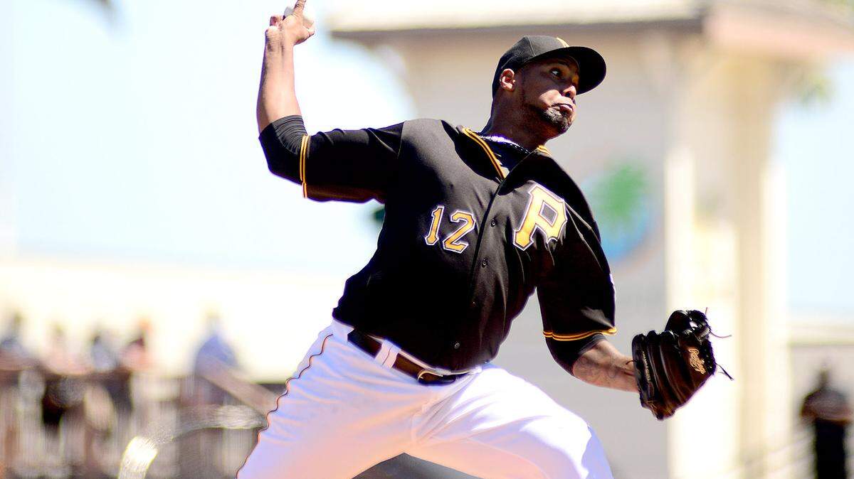 Starting pitcher Juan Nicasio (12) delivers a pitch. The Pittsburgh Pirates played the Houston Astros in Grapefruit league action at McKecknie filed inBradenton, FL on Sunday, March 6, 2016. 
 DAVID W DOONAN | Special To The Herald