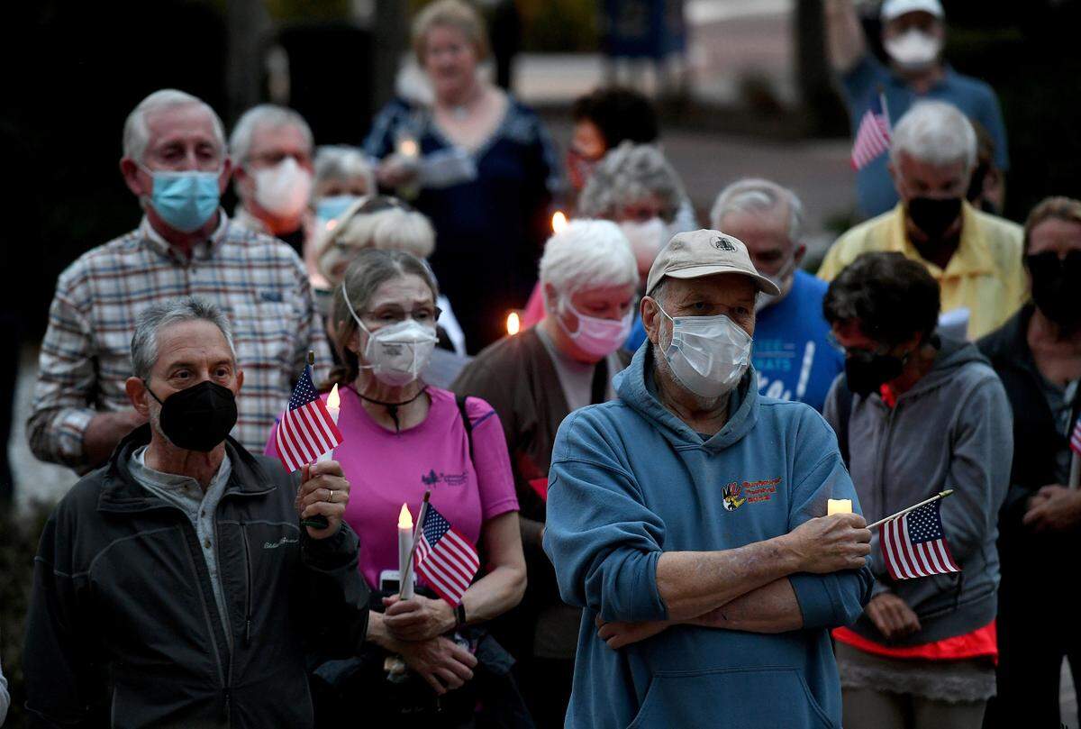 01/06/22—People gathered at Manatee County’s Historic courthouse for a Vigil for Democracy hosted by Indivisible Manatee on the anniversary of the U.S. Capitol riot.
