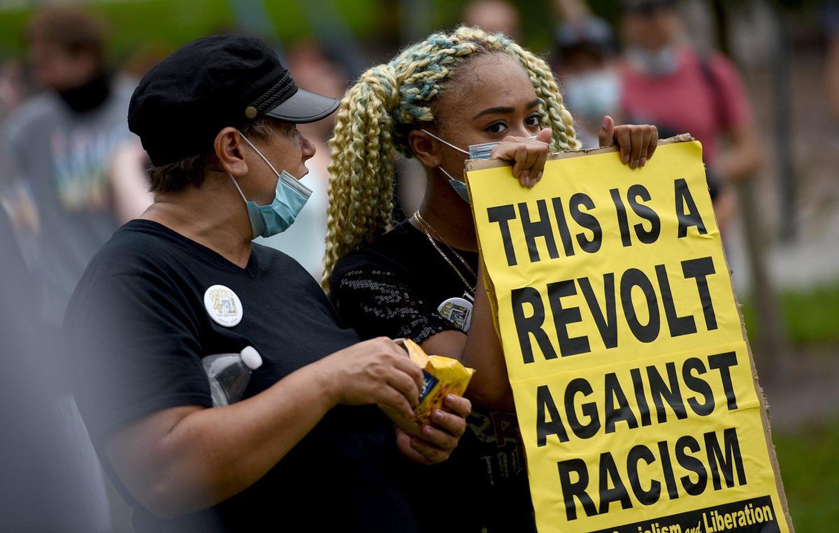 Black Lives Matter Manasota Alliance marched against racism from Bradenton over the Green Bridge and joined an earlier group in Sutton Park in Palmetto.
