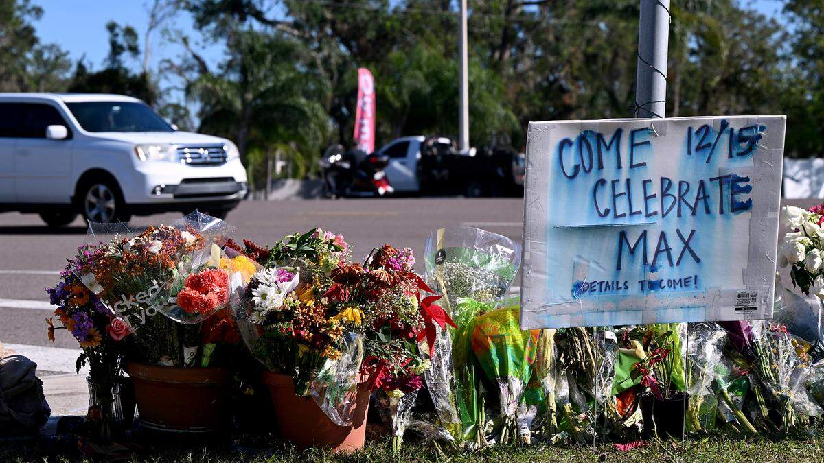 A roadside memorial for Max Peugh sits on the sidewalk in Parrish on Nov. 17, 2024.