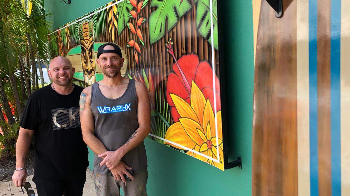 Joey Bennett, left, and Matt McAllister stand outside The Bamboozer, an island style bar on the site of the The Old Main Pub, 313 12th St. W., in Bradenton. Bennett was hoping to be serving drinks to customers there on July 3, but the state issued an order Friday banning such sales because of the coronavirus pandemic.