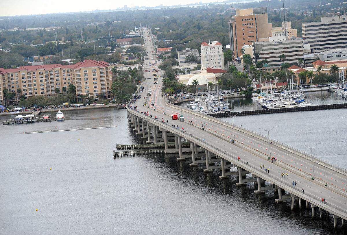 A crowd gathers on the Green Bridge before the races begin during the Bradenton Area River Regatta.