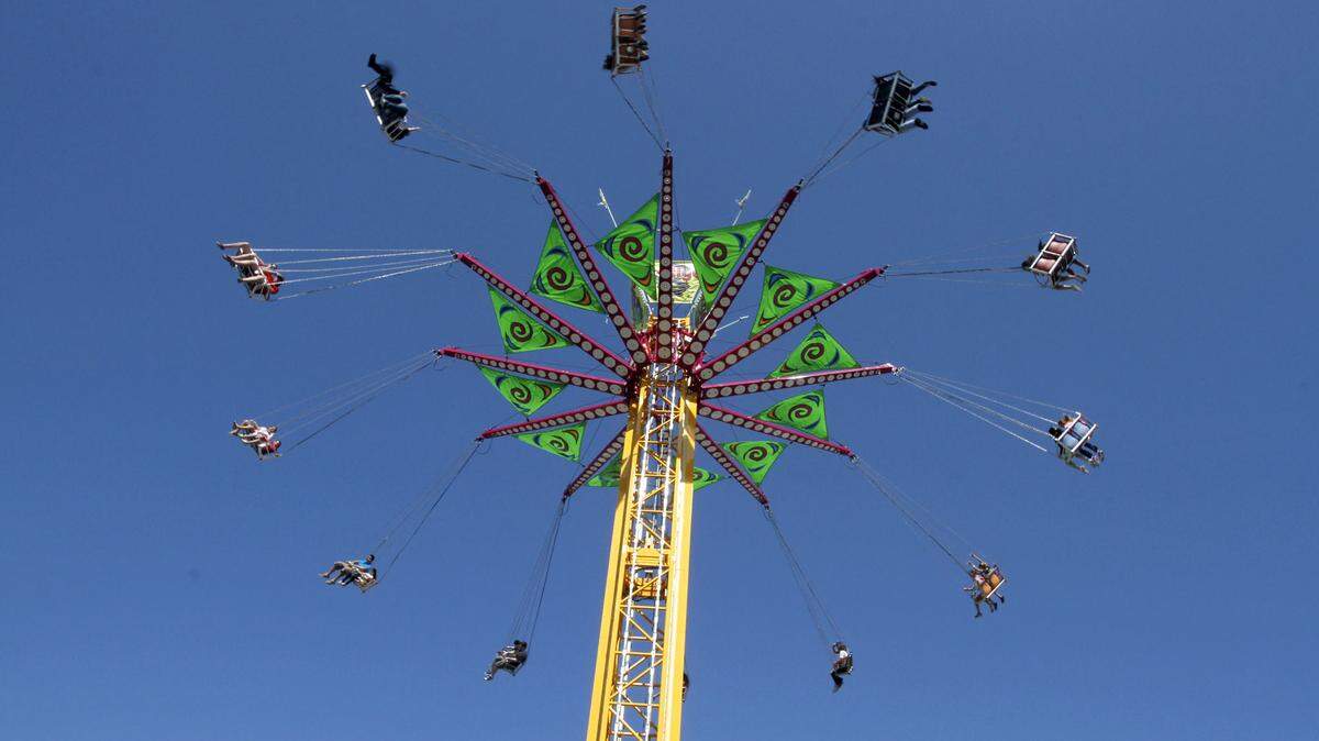 Brave people take a spin on the aptly named carnival ride -- the Vertigo -- at a festival in Biloxi, Miss. HERALD FILE PHOTO