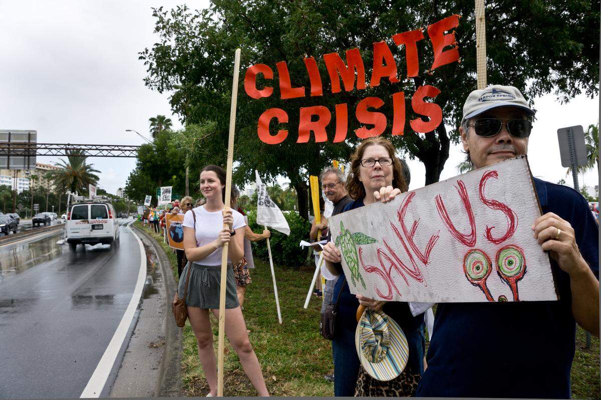 More than 200 people lined the edge of Bayfront Drive, in front of Sarasota’s Unconditional Surrender Statue, to join a global climate strike on Sep. 20, 2019. 