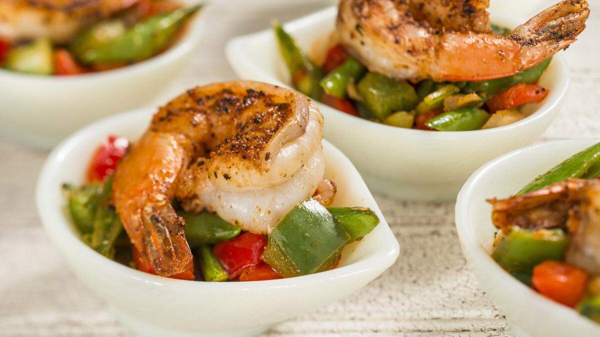 Grilled Sweet and Spicy Bush Berry Shrimp with Pineapple, Pepper, Onion, and Snap Peas at the Australia Marketplace is one of the many delectable dishes from around the world during the Epcot International Food & Wine Festival at Walt Disney World Resort in Lake Buena Vista, Fla. The popular fall festival also features wine tastings, culinary demonstrations, mixology seminars, nightly "Eat to the Beat" concerts and a broad range of premium dining events. (Matt Stroshane, photographer)