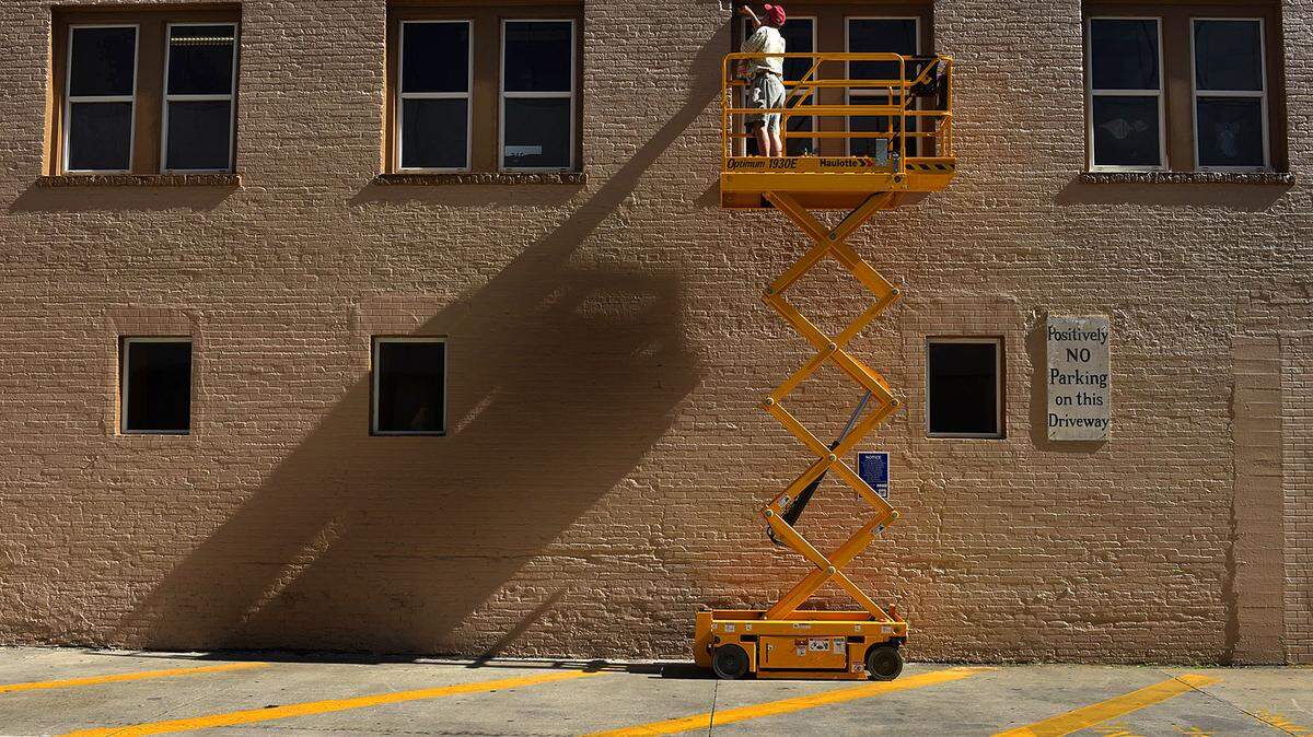 Touching up the Ivey buildingBill Cook works up high on a mechanical lift doing some touch-up painting to the Ivey building at 435 Main St., home to Mike Carter Construction. The Bradenton building was originally constructed in 1912. It was a nice day for painting outdoors. The sunny weather will continue with highs in mid to upper 80s through the weekend and a low chance of rain, according to weather.com TIFFANY TOMPKINS/Bradenton Herald