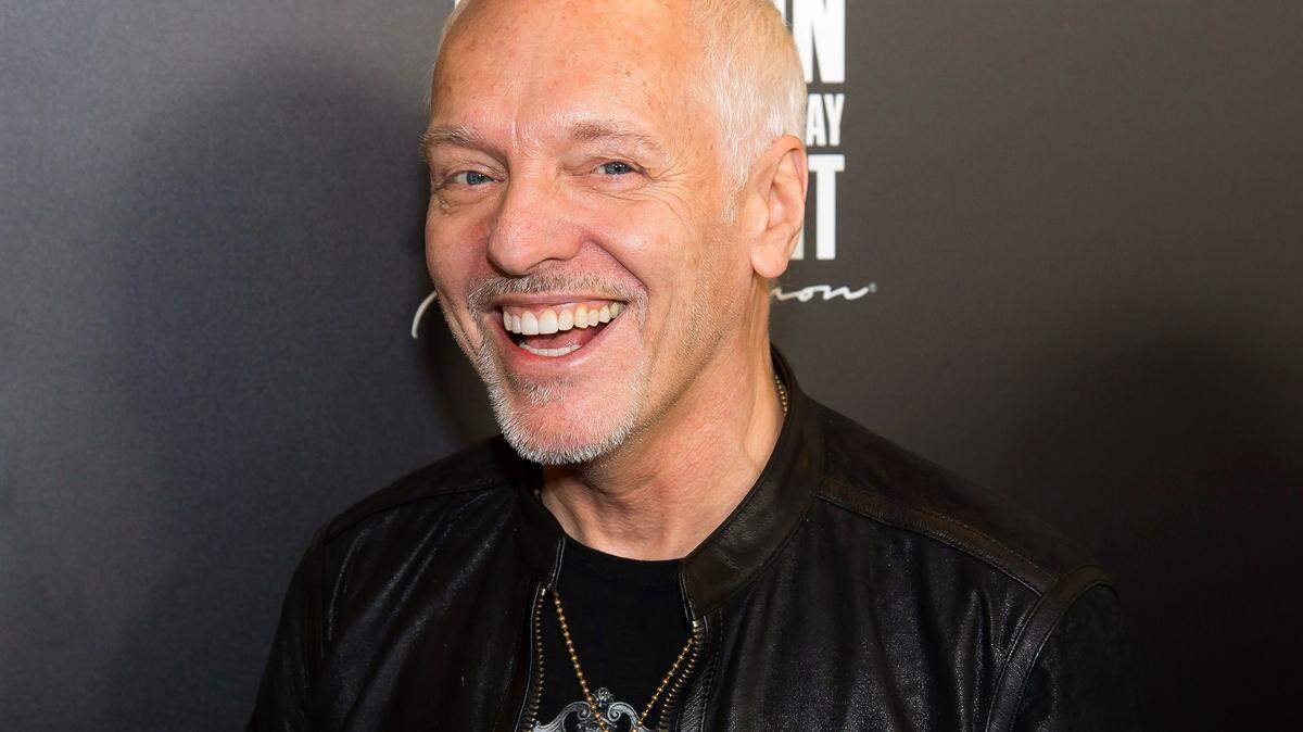 FILE - In this Dec. 5, 2015 file photo, Peter Frampton attends the Imagine: John Lennon 75th Birthday Concert at Madison Square Garden in New York. The English-born Frampton, now 65, released, ìAcoustic Classics,î a CD of stripped-down versions of his best-known songs, in February. (Photo by Charles Sykes/Invision/AP, File)