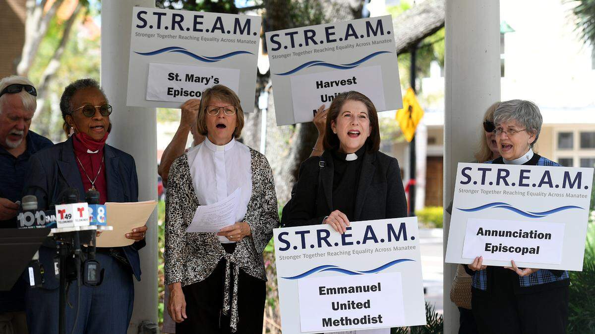 Faith leaders gather during a press conference to commend State Attorney Ed Brodsky for adopting a pre-arrest diversion program in Sarasota for non-violent misdemeanors on October 26, 2022. The group of leaders, called STREAM, are calling upon Sheriff Wells to adopt the program in Manatee County.