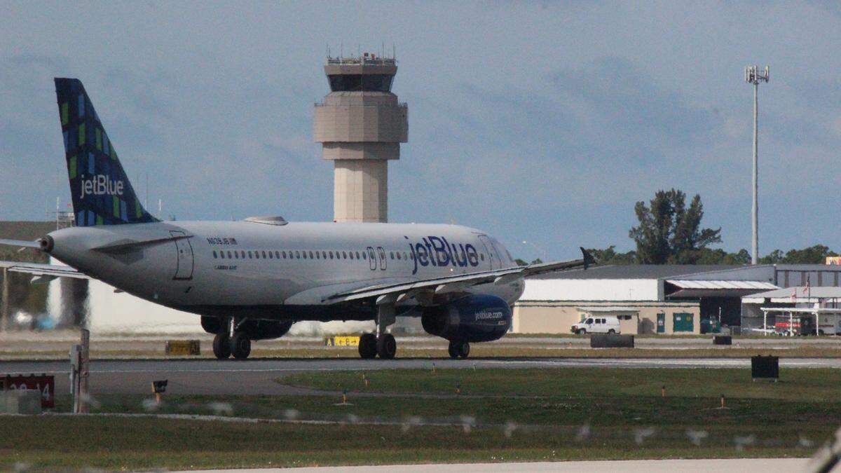 A jetBlue airliner picks up speed down the runway to take off from Sarasota Bradenton International Airport on Wednesday.