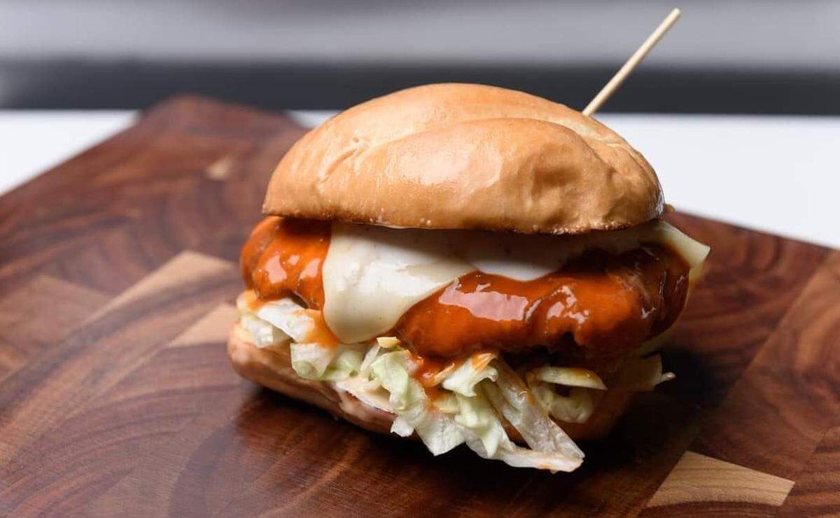 The Barnyard in Oneco Farmers Market has quickly earned a reputation for its stellar chicken sandwiches, like the Buffalo Barnyard Betty (pictured).