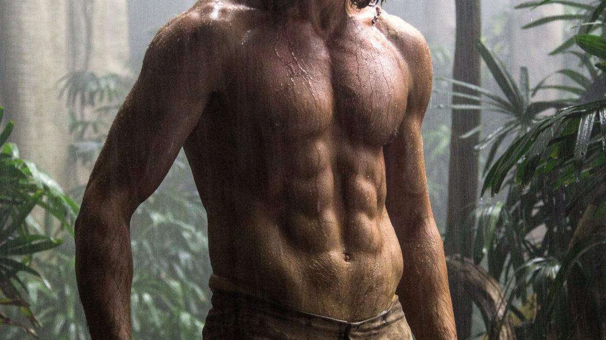 This image released by Warner Bros. Entertainment shows Alexander Skarsgard as Tarzan in a scene from, "The Legend of Tarzan." (Jonathan Olley/Warner Bros. Entertainment via AP)
