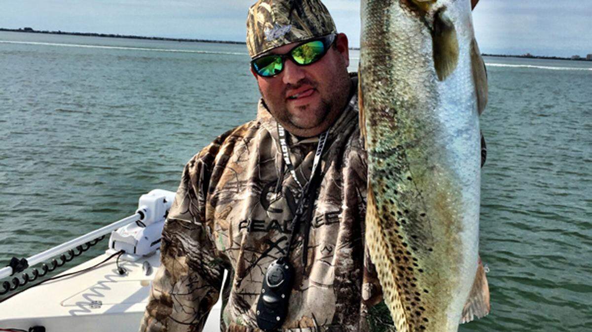 Capt. Steve Brownlee shows off a big trout he landed recently. PROVIDED PHOTO